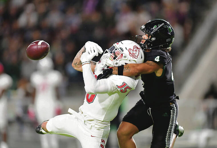 STEVEN ERLER/SPECIAL TO THE STAR-ADVERTISER / NOV. 30
                                Hawaii Warriors defensive back Cam Stone (4) knocked down a long pass.