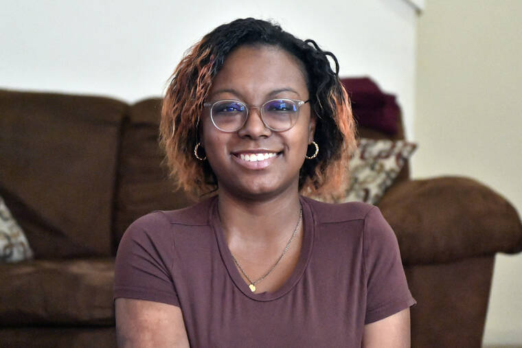 ASSOCIATED PRESS
                                Jalen Matthews sits on her yoga mat in her home in Louisville, Ky., on Dec. 4. She was diagnosed with sickle cell at birth and had her first pain crisis at age 9. Three years later, the disease led to a spinal cord stroke that left her with some paralysis in her left arm and leg. “I had to learn how to walk again, feed myself, clothe myself, basically learn how to do everything all over again,” said Matthews, who is now 26.