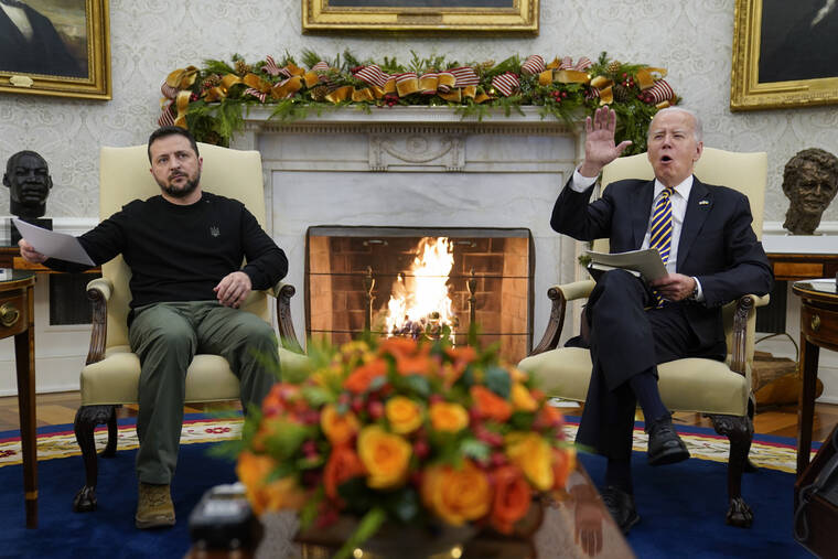 ASSOCIATED PRESS
                                President Joe Biden meets with Ukrainian President Volodymyr Zelenskyy in the Oval Office of the White House, today, in Washington