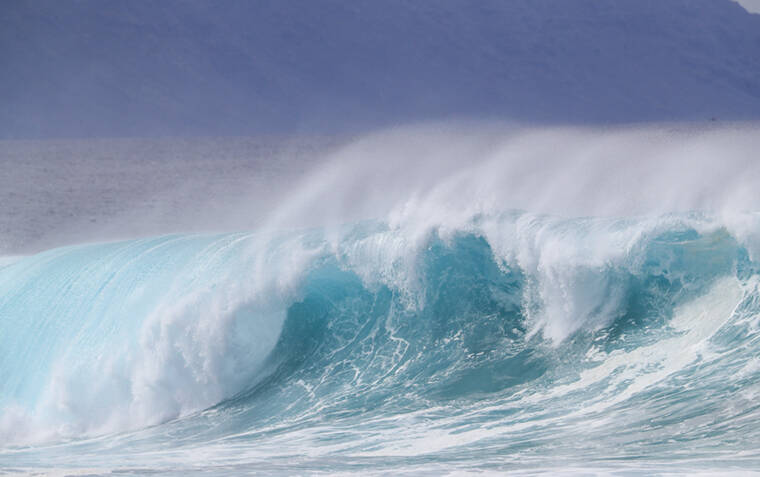 JAMM AQUINO / JAQUINO@STARADVERTISER.COM
                                A large wave crashes onto the shore at Banzai Pipeline, in December 2022, on Oahu’s North Shore. The National Weather Service has issued a high surf advisory for the north- and west-facing shores of most isles, including Oahu, effective until 6 p.m. Thursday.