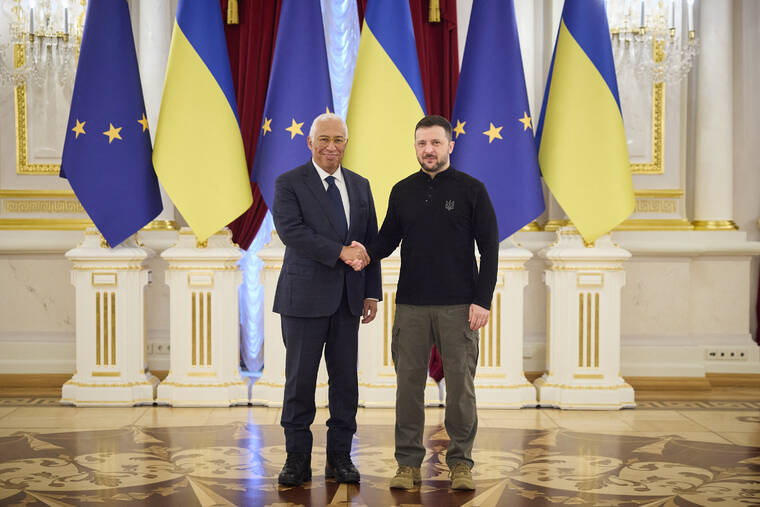 UKRAINIAN PRESIDENTIAL PRESS SERVICE/HANDOUT VIA REUTERS
                                Ukraine’s President Volodymyr Zelensky shakes hands with European Council President Antonio Costa before a joint press conference, amid Russia’s attack on Ukraine, in Kyiv, Ukraine.