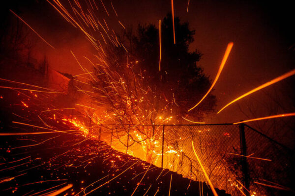 Malibu wildfire rages on, destroys structures in California