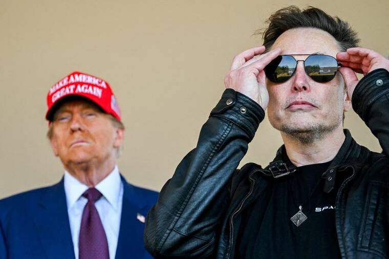 BRANDON BELL/POOL VIA REUTERS/FILE PHOTO/FILE PHOTO
                                President-elect Donald Trump and Elon Musk watch the launch of the sixth test flight of the SpaceX Starship rocket in Brownsville, Texas, on Nov. 19. The Trump transition team wants the incoming administration to drop a car-crash reporting requirement opposed by Elon Musk’s Tesla, according to a document seen by Reuters, a move that could cripple the government’s ability to investigate and regulate the safety of vehicles with automated-driving systems.