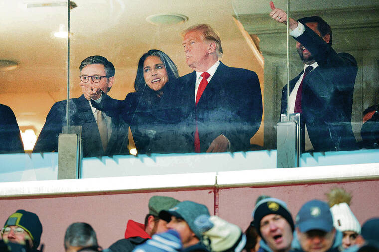 BRIAN SNYDER / REUTERS
                                U.S. House Speaker Mike Johnson, R-La.; Tulsi Gabbard, director of national intelligence nominee; President-elect Donald Trump; and Vice President-elect J.D. Vance took in the Army-Navy foot- ball game Saturday in Landover, Md.