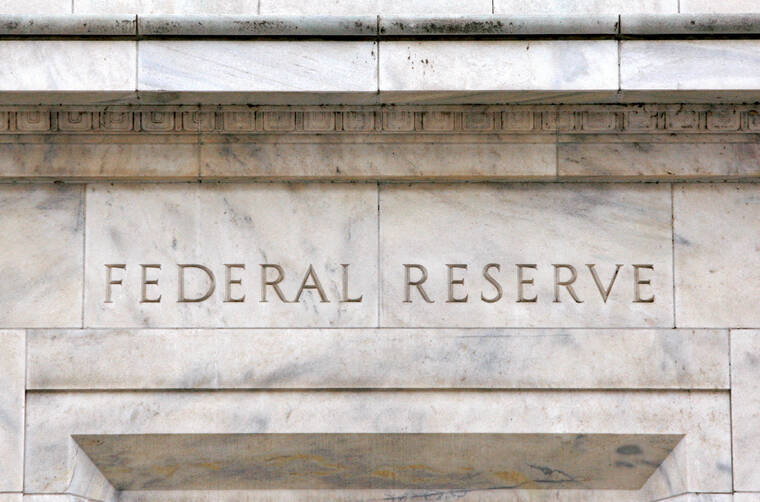 Fed lowers key rate quarter-point; sees slower pace of cuts