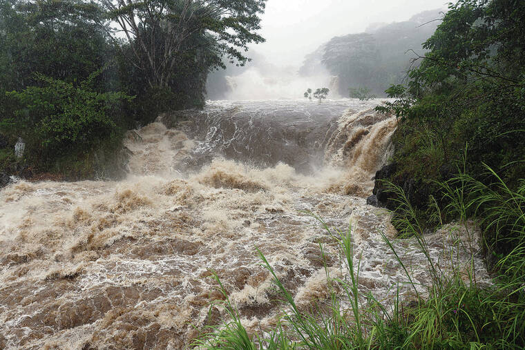 NEW YORK TIMES / AUG. 25
                                Floodwaters overwhelmed the Wailuku River as a result of heavy rain from Hurricane Hone in Hilo in August.