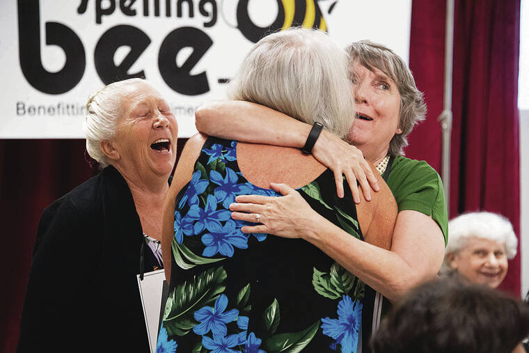 CRAIG T. KOJIMA / CKOJIMA@STARADVERTISER.COM
                                Terri Simpson, middle, was consoled after being eliminated in the second round.