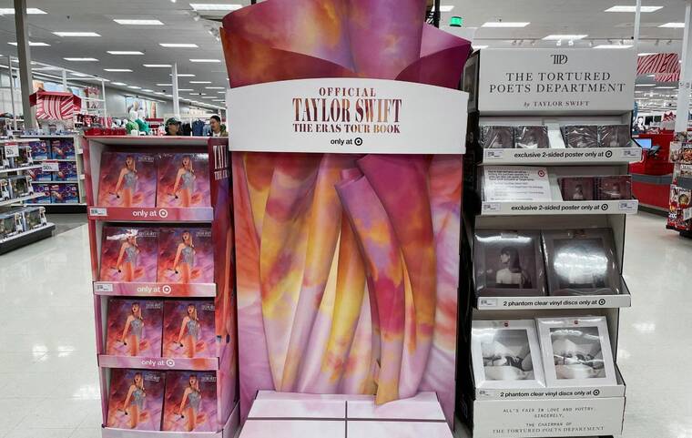 REUTERS/SIDDHARTH CAVALE/FILE PHOTO
                                Taylor Swift merchandise on display at a Target store in North Bergen, N.J, today.