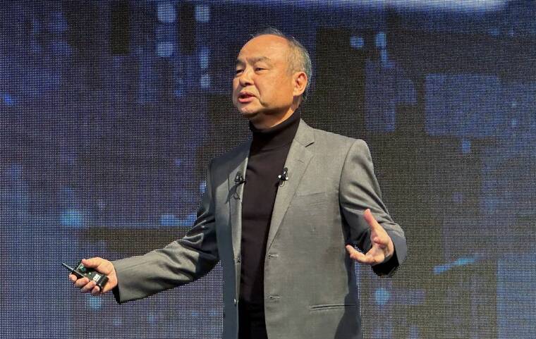 REUTERS/FRANCIS TANG/FILE PHOTO
                                SoftBank CEO Masayoshi Son speaks at the SoftBank World 2023 corporate conference, in Tokyo, Japan, in October 2023. President-elect Donald Trump, with SoftBank Group CEO Masayoshi Son at his side, announced today that SoftBank would invest $100 billion in the U.S. over the next four years in what would be a boost to the U.S. economy.