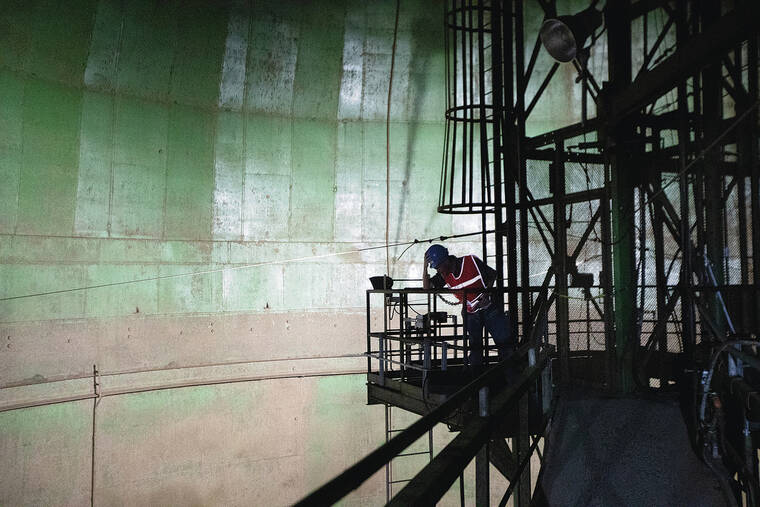 GEORGE F. LEE / 2023
                                At top, inside Upper Tank No. 19 during a tour of the Red Hill Fuel Storage Facility in Halawa Valley in 2023.