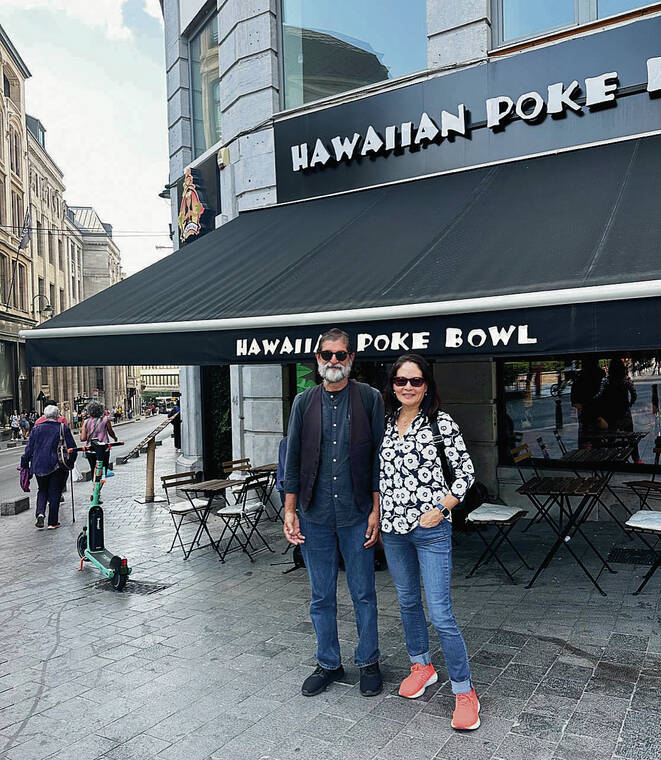 A local cab driver was kind enough to snap a picture of Yunus Peer and Laurie Lee, who traveled from Waimanalo to Brussels, Belgium, where they were surprised to find a Hawaiian Poke Bowl restaurant.