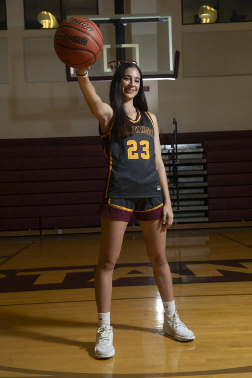 GEORGE F. LEE / GLEE@STARADVERTISER.COM 
                                Maryknoll’s Pua Herrington stands out on the basketball court.